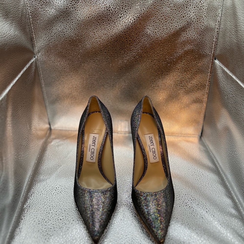 Jimmy Choo pumps. Brand new never worn